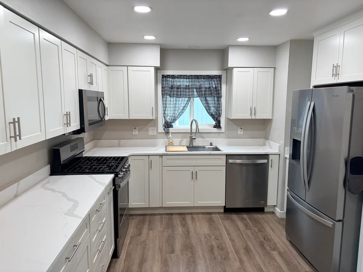 Kitchen gut on the same footprint — Taku-Campbell — after