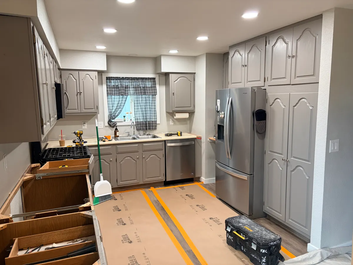 Kitchen gut on the same footprint — Taku-Campbell — before