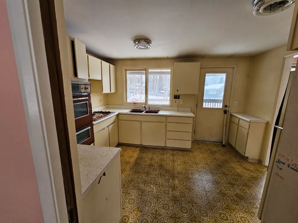 Open-kitchen whole-home renovation — Spenard — before