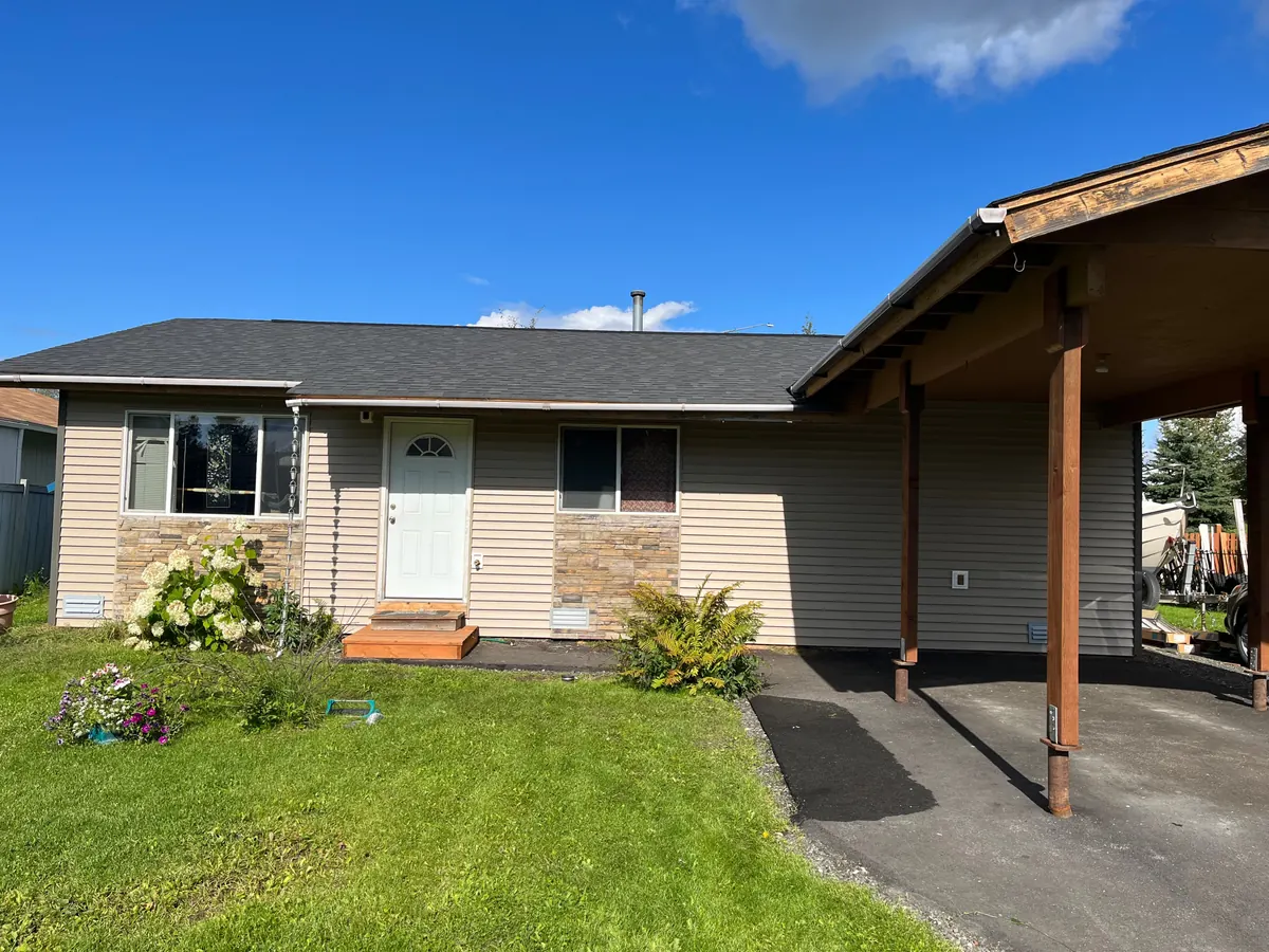 Full vinyl re-side — South Anchorage — after