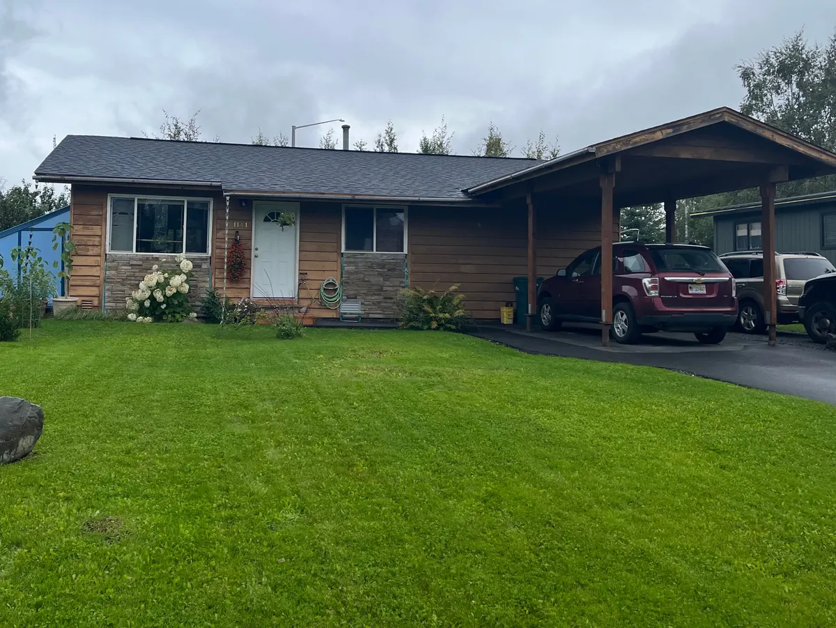 Full vinyl re-side — South Anchorage — before